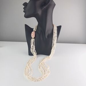 6 Steand Rice Pearl Necklace with Carved Angel Skin Coral Clasp